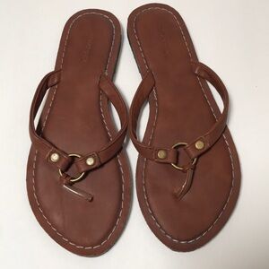 Living Legacy brown flip flops